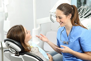 a dentist discussing the cost of ClearCorrect in Palm Bay