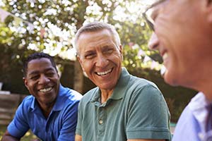 group of men laughing together