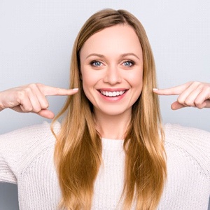 Woman smiles after orthodontics in Palm Bay