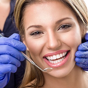 Woman happy at emergency dentistry visit