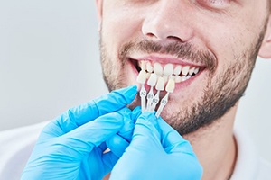 man being fitted with porcelain veneers in Palm Bay 