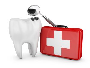 tooth beside red emergency kit