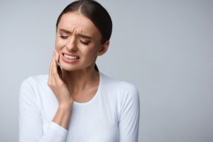 Woman with jaw pain