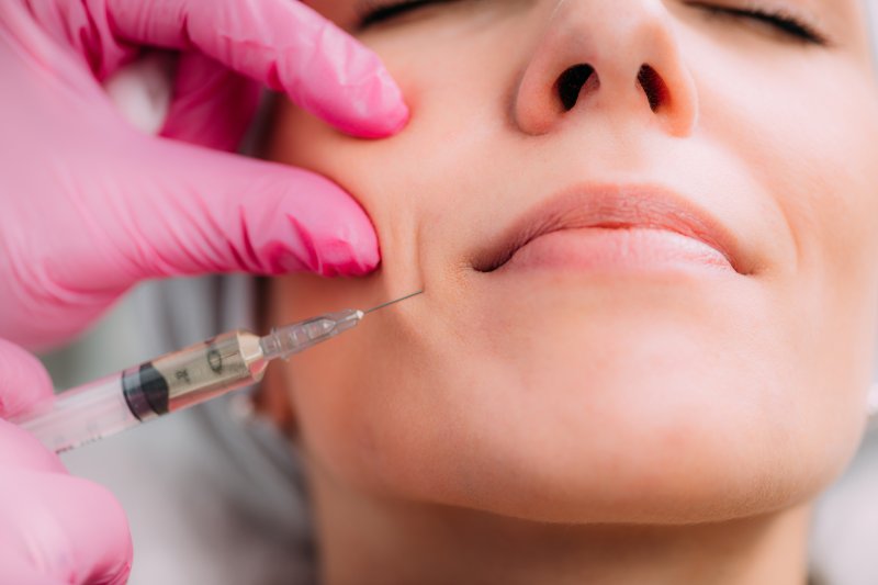 Woman getting dermal fillers